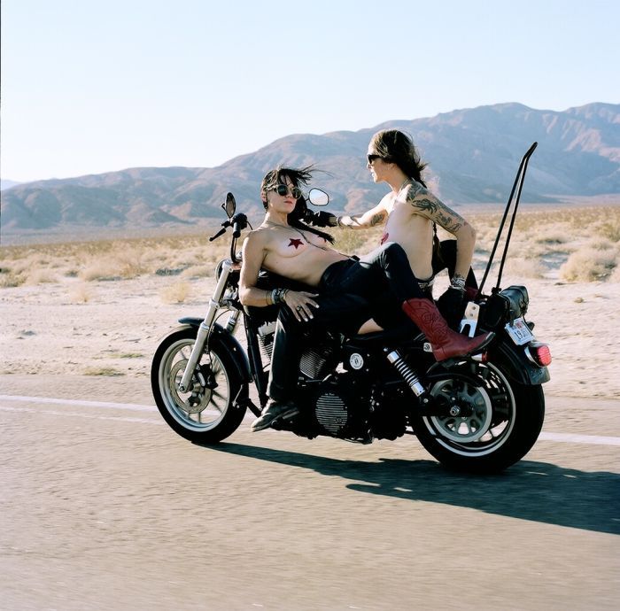 Girls on a motorcycle in Hailun